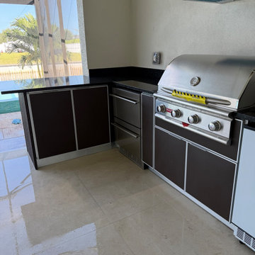 Modern Outdoor Kitchen in Cape Coral, FL | Custom Aluminum & StarBoard Design