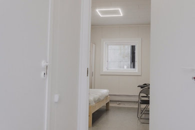 Example of a danish bedroom design in Other