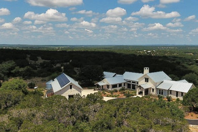 Large cottage exterior home photo in Austin