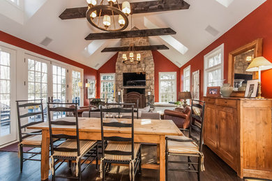Large mountain style dark wood floor and brown floor great room photo in New York with red walls