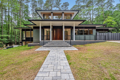 Example of a minimalist exterior home design in Raleigh