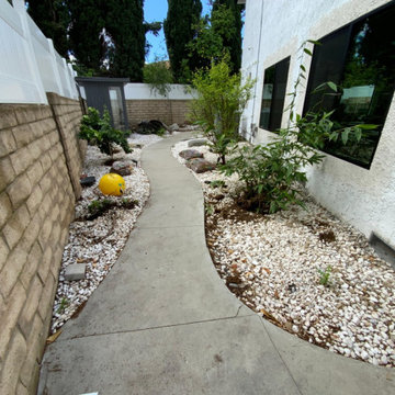 Before: Outdated Side Yard with Rock Ground Cover & Limited Usability | Winnetka