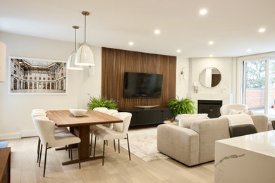 Family room - mid-sized contemporary open concept vinyl floor, beige floor and wall paneling family room idea in Ottawa with white walls, a wood stove, a tile fireplace and a wall-mounted tv