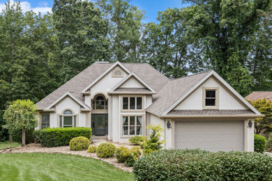 Inspiration for a mid-sized craftsman house exterior remodel in Other with a shingle roof