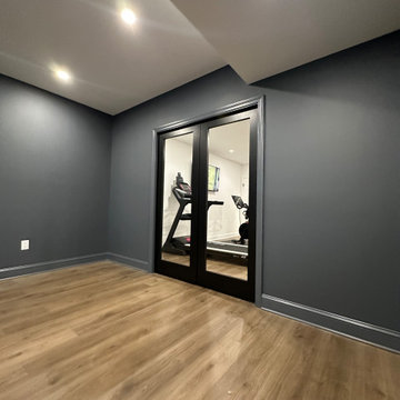 Massive finished basement with sauna and gym.
