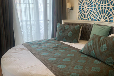 Example of a minimalist bedroom design in Denver