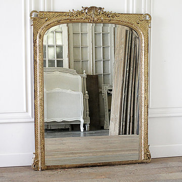 Early 20th Century Louis Philippe Style Giltwood Mirror with Clamshell Carvings