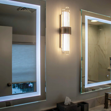 Primary Suite Remodel with Blue Cabinetry and Calacatta Miraggio Duo Quartz