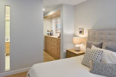 Example of a minimalist bedroom design in Vancouver