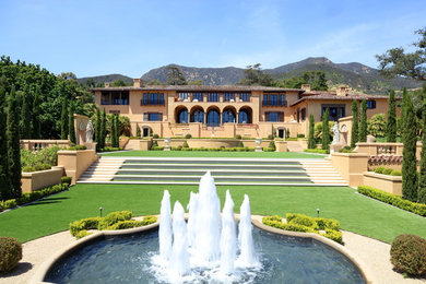 Tuscan home design photo in Los Angeles