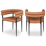 Meridian Furniture - Lavina Upholstered Dining Chair, Cognac, Vegan Leather, Set of 2 - Experience the sophisticated allure of the Lavina cognac vegan leather dining chair. This chair features a matte black finish and an iron metal frame, ensuring both durability and a modern edge. The contemporary design and luxurious vegan leather elevate your dining space with effortless elegance, making it the perfect centerpiece for gatherings. Enhance your dining area where classic elegance meets contemporary flair.