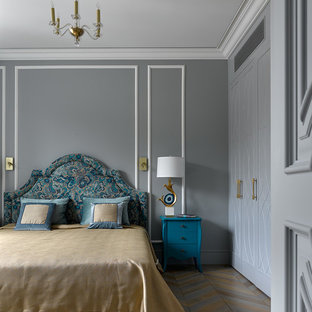 Transitional master bedroom in Moscow with grey walls, medium hardwood floors and multi-coloured floor.