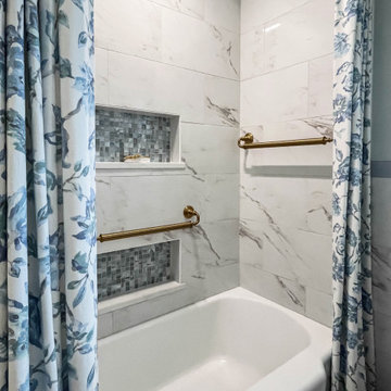 Blue and White Guest Bathroom with Gold Accents