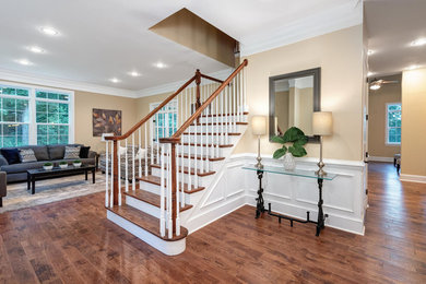Entryway - large traditional dark wood floor and brown floor entryway idea in Philadelphia