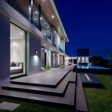 Benedict Canyon Beverly Hills luxury home modern bedrooms with sliding glass wal