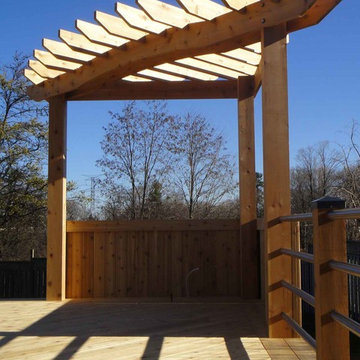 Cedar deck with pergola and stainless steel railings