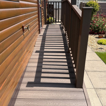 Narrow Composite Walkway Along a Lodge Wall