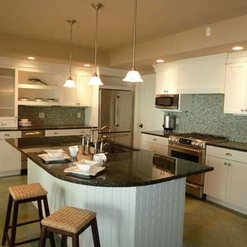 Basement Kitchen Makes Entertaining Lakeside Easy with White Cabinets and Blue G