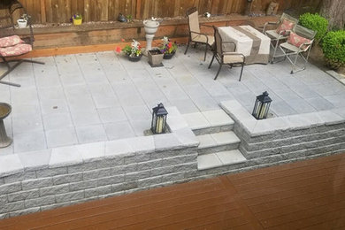 Inspiration for a modern backyard brick patio remodel in Seattle