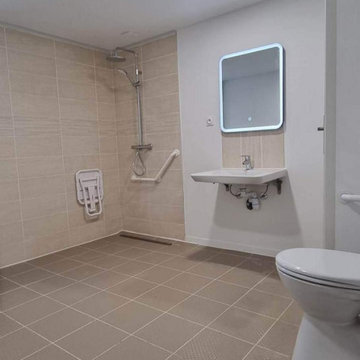 transformation d'un garage en salle de bain avec les normes PMR