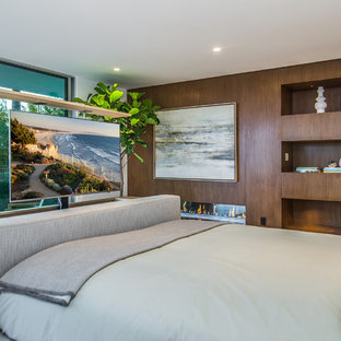 75 Beautiful Ceramic Floor Bedroom With A Wood Fireplace Surround