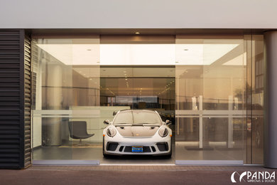 Inspiration for a large industrial attached two-car carport remodel in Denver