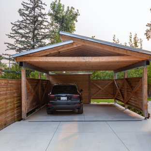 Inspiration for a modern partial sun side yard concrete paver and wood fence landscaping in Toronto for summer.
