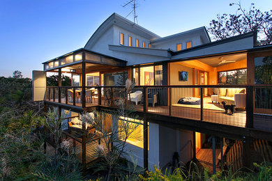 This is an example of a beach style home design in Sunshine Coast.