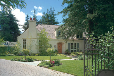 Mid-sized elegant beige two-story stucco exterior home photo in San Francisco