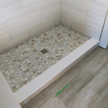 Custom Marble shower with 3D pan tile