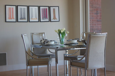 Example of a minimalist dining room design in Denver