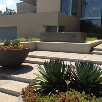 ']Sculptural Moves' -walks, planter bowls, and fountain become one.