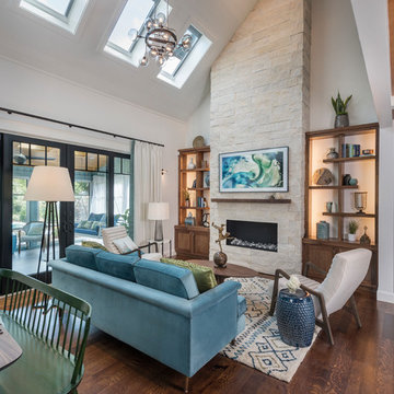 Sea Toned Contemporary Living Room with Striking Stone Firepalce
