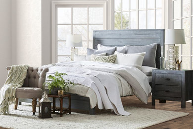 Inspiration for a mid-sized transitional master dark wood floor and brown floor bedroom remodel in Chicago with white walls and no fireplace