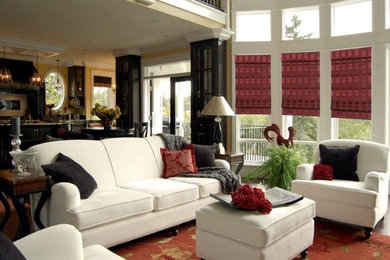 Living room - mid-sized traditional open concept living room idea in Charleston with beige walls