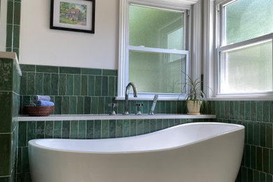 Freestanding bathtub - craftsman green tile and ceramic tile freestanding bathtub idea in Detroit