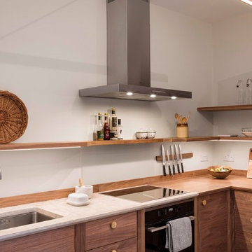 Stylish Freestanding Walnut Kitchen with Concrete worktops