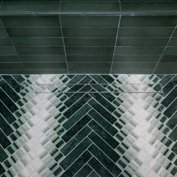Herringbone Shower Floor with Green and White Tile