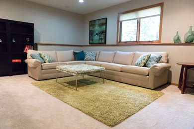 Example of a large transitional open concept carpeted living room design in Milwaukee with beige walls
