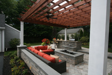 Example of an eclectic patio design in New York