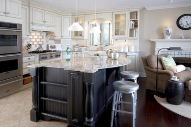 Large trendy l-shaped porcelain tile and beige floor eat-in kitchen photo in Bridgeport with a farmhouse sink, beaded inset cabinets, white cabinets, marble countertops, white backsplash, ceramic backsplash, stainless steel appliances and an island