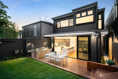 Design ideas for a modern two-storey grey house exterior in Sydney.