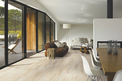 Great room - contemporary porcelain tile great room idea in Toronto with white walls