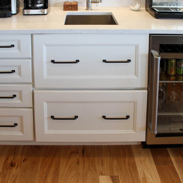 White and Gray Kitchen with Massive Storage Solutions
