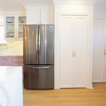 Stainless Refrigerator with Tall White Pantry Cabinets | East York