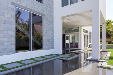 Inspiration for a modern pool remodel in Miami