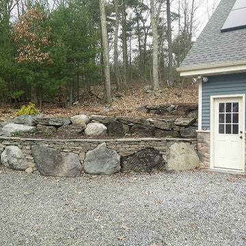 Semi-Dry laid retaining wall on exisiting boulders