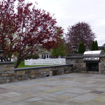 Bluestone Patio with Granite Cobblestone walls
