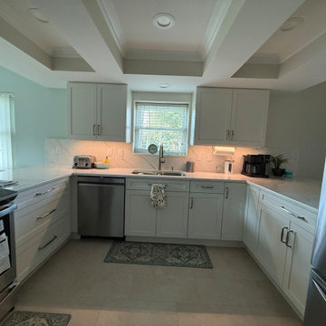 White Cabinets, Quartz Counters, Stunning Results