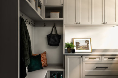 Transitional laundry room photo in Chicago